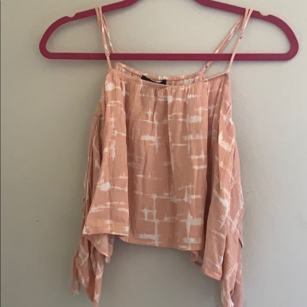 pink loose crop top with baggy sleeves